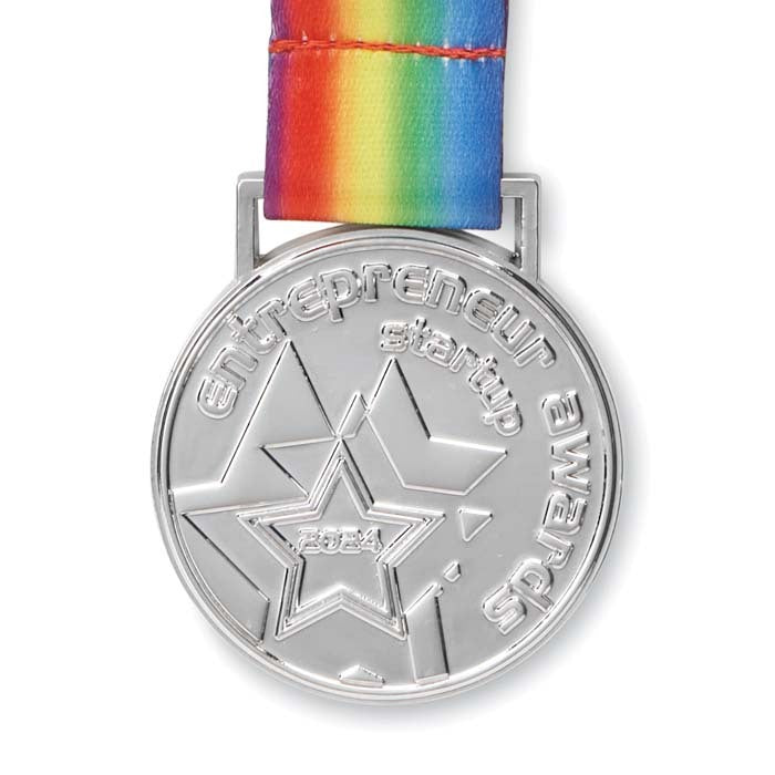 Vichy | Médaille en relief en alliage de zinc avec rubans cousus en boucle.