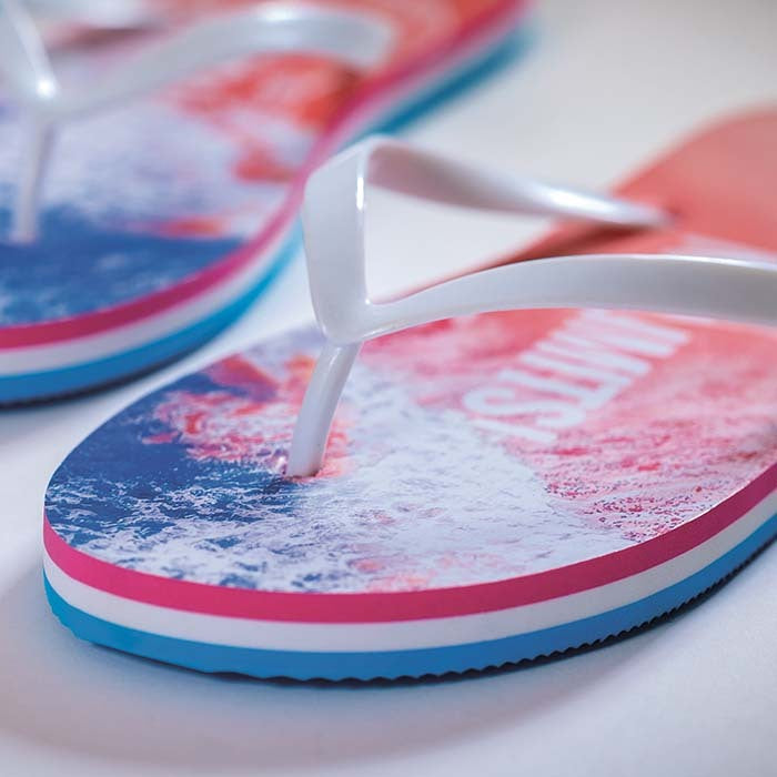 Cauterets | Tongs à triple épaisseur: laissez les empreintes de votre logo dans le sable.